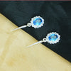 Aqua Élan” – 925 Sterling Silver Blue Stone Halo Drop Earrings