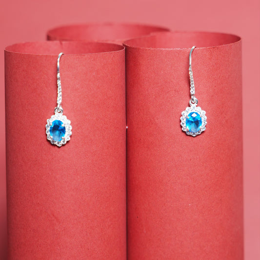 Aqua Élan” – 925 Sterling Silver Blue Stone Halo Drop Earrings