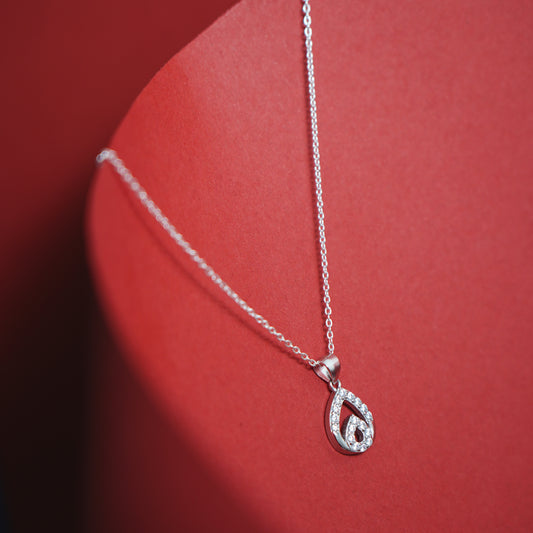 Tears of Grace” – Teardrop Spark Pendant