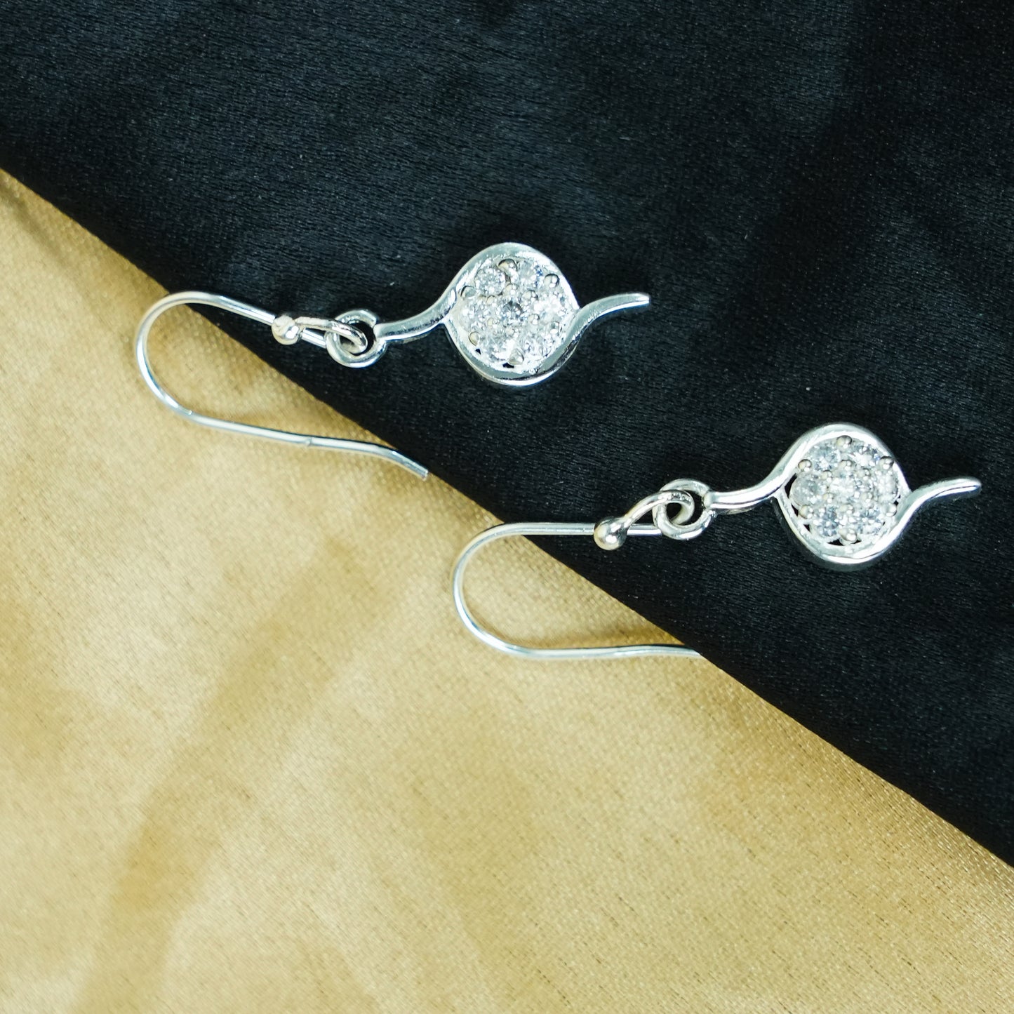 Elvina Twist” – 925 Sterling Silver Curved Drop Earrings